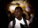 Garang Kuol of the Socceroos talks to he media on arrival at Sydney International Airport on December 05, 2022 in Sydney, Australia. (Photo by Mark Evans/Getty Images)
