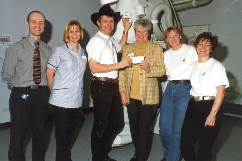 Stetson wearing David Birkinshaw presented a cheque for £1,000 to Janet Conroy, chairman of the Dreamheart Appeal, flanked by, from left, senior radiographer Andrew Grierson,  Sr Alison Buckley, Susan Brennan and Julie French.