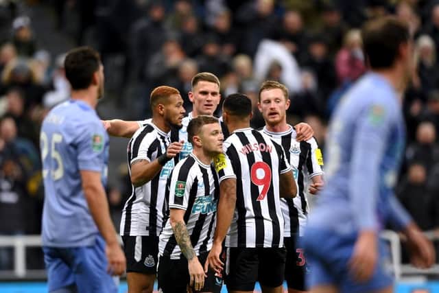 Callum Wilson, Joelinton, Kieran Trippier and Sean Longstaff celebrate after Newcastle United take the lead against Bournemouth in the Carabao Cup.