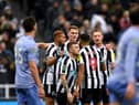 Callum Wilson, Joelinton, Kieran Trippier and Sean Longstaff celebrate after Newcastle United take the lead against Bournemouth in the Carabao Cup.