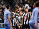 Callum Wilson, Joelinton, Kieran Trippier and Sean Longstaff celebrate after Newcastle United take the lead against Bournemouth in the Carabao Cup.