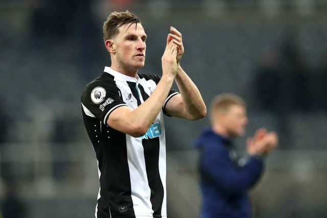 Chris Wood of Newcastle United applauds fans after their sides draw during the Premier League match between Newcastle United and Watford at St. James Park on January 15, 2022 in Newcastle upon Tyne, England. (Photo by Ian MacNicol/Getty Images)