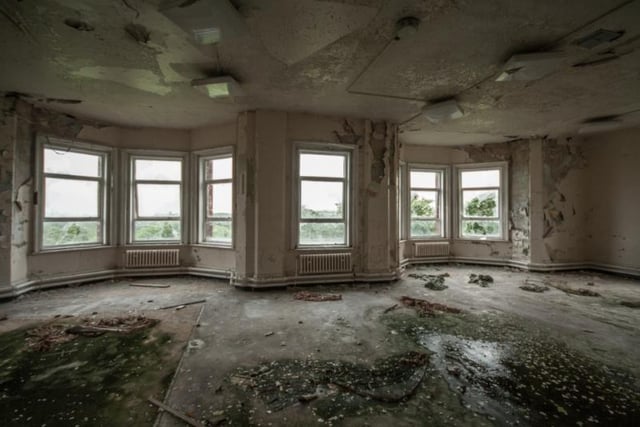 The abandoned hospital was subjected to the weather before it was knocked down.