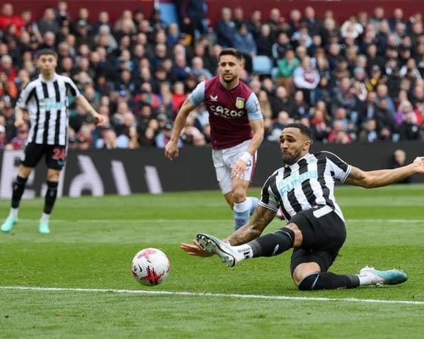 Callum Wilson of Newcastle United shoots during the Premier League match between Aston Villa and Newcastle United at Villa Park on April 15, 2023 in Birmingham, England. (Photo by Shaun Botterill/Getty Images)