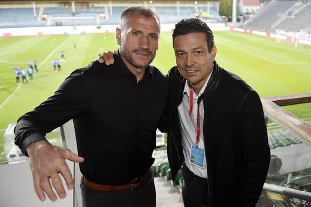 Shefki Kuqi and former Finland team-mate Jari Litmanen in 2018.