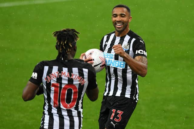 Allan Saint-Maximin congratulates Callum Wilson on his first goal against Burnley.