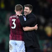 Steven Gerrard, Manager of Aston Villa celebrates with Matt Target after their side's victory in the Premier League match between Norwich City and Aston Villa at Carrow Road on December 14, 2021 in Norwich, England. (Photo by Justin Setterfield/Getty Images)