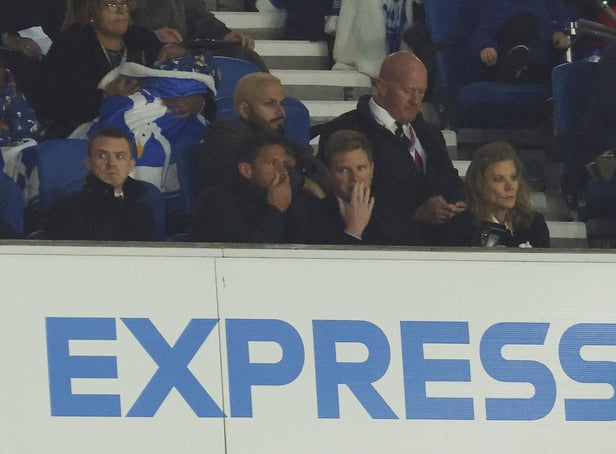 Eddie Howe, centre, is seen watching the game from the stands with Jason Tindall, left, and Newcastle United part-owner Amanda Staveley, right.