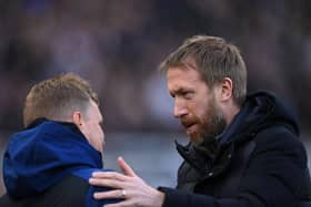 Newcastle Head coach Eddie Howe with Brighton head coach Graham Potter (r) on the sidelines during the Premier League match between Newcastle United and Brighton & Hove Albion at St. James Park on March 05, 2022 in Newcastle upon Tyne, England. (Photo by Stu Forster/Getty Images)