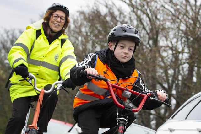 South Tyneside Council’s Bikeability Instructor Judith Ely with pupil Ellis.