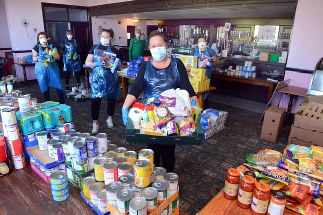 Joanne Crosby and volunteers with their food donations at the Red Hackle, Jarrow.