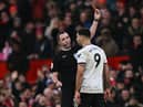 Fulham striker Aleksandar Mitrovic is sent off at Old Trafford after pushing referee Chris Kavanagh.