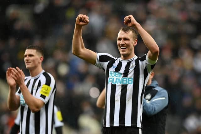 Dan Burn of Newcastle United celebrates following the team's victory in the Carabao Cup Semi Final 2nd Leg match between Newcastle United and Southampton at St James' Park on January 31, 2023 in Newcastle upon Tyne, England. (Photo by Gareth Copley/Getty Images)
