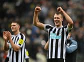 Dan Burn of Newcastle United celebrates following the team's victory in the Carabao Cup Semi Final 2nd Leg match between Newcastle United and Southampton at St James' Park on January 31, 2023 in Newcastle upon Tyne, England. (Photo by Gareth Copley/Getty Images)