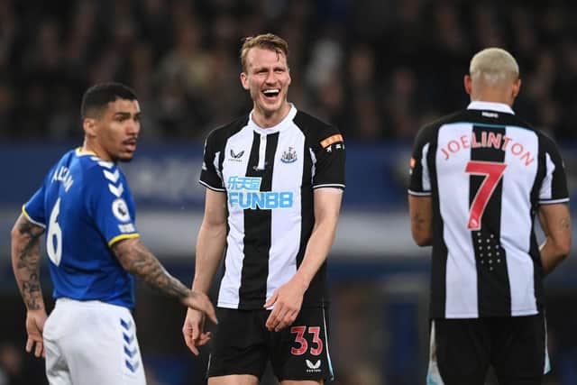 Dan Burn reacts during the Premier League match between Everton and Newcastle United.