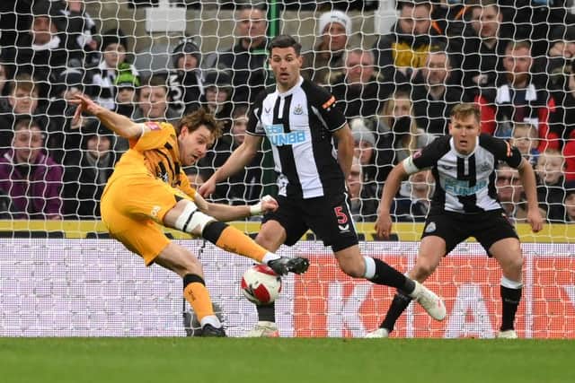 Cambridge striker Joe Ironside shoots to score the winning goal during the Emirates FA Cup Third Round match between Newcastle United and Cambridge United at St James' Park on January 08, 2022 in Newcastle upon Tyne, England. (Photo by Stu Forster/Getty Images)