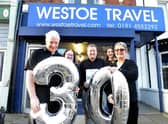 Westoe Travel owners Graeme and Joan Brett and staff from left Gillian Vogel, Martin Brett and Alice Appleby celebrate the company's 30th anniversary in 2019.