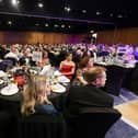 Guests were entertained by a comedian and a live band.