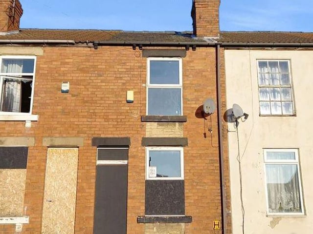 Two-bedroom, mid-terrace house - guide price, £20,000-plus.