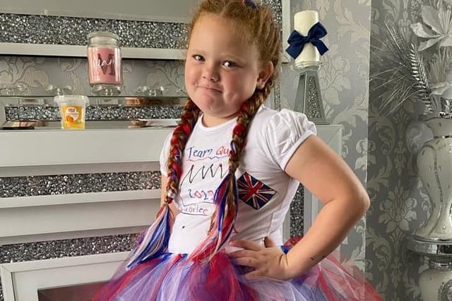 Mercedes, age 9, shows off her custom Jubilee t-shirt.