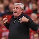 Newcastle United boss Steve Bruce is under pressure after another defeat on Saturday against Manchester United (Photo by OLI SCARFF/AFP via Getty Images)