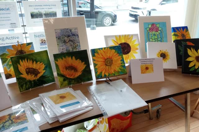 Some of the sunflower pictures by members of the Tom Finch Watercolour Group.
