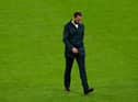 Gareth Southgate, Head Coach of England looks dejected as he walks across the pitch.