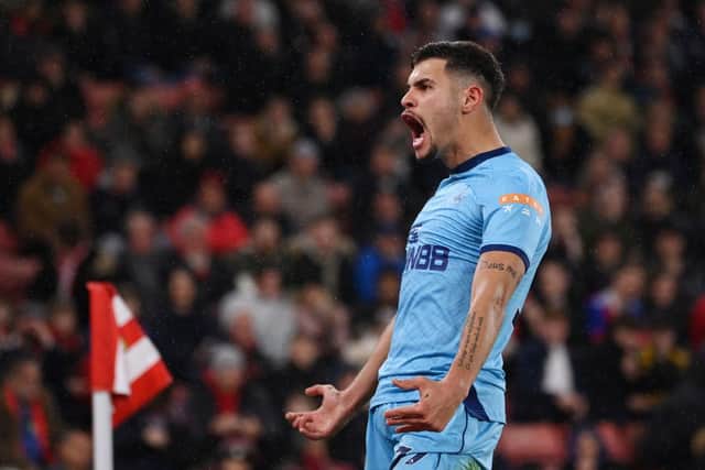 Bruno Guimaraes of Newcastle United celebrates scoring their sides second goal of the game during the Premier League match between Southampton and Newcastle United at St Mary's Stadium on March 10, 2022 in Southampton, England.  (Photo by Mike Hewitt/Getty Images)