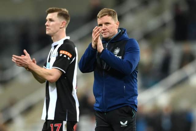 Emil Krafth and Eddie Howe applaud Newcastle United fans after the club's FA Cup defeat.