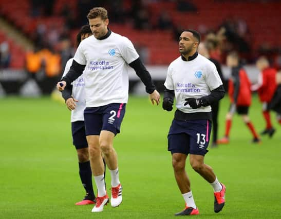 Former Bournemouth captain Simon Francis pictured with Newcastle United striker Callum Wilson. (Photo by Richard Heathcote/Getty Images)