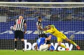Neal Maupay of Brighton & Hove Albion scores their team's third goal during the Premier League match between Brighton & Hove Albion and Newcastle United.