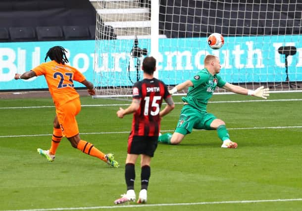 Newcastle's Valentino Lazaro scores his side's fourth goal against Bournemouth.