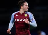 Jack Grealish of Aston Villa looks on during the Premier League match between Brighton & Hove Albion and Aston Villa at American Express Community Stadium on February 13, 2021 in Brighton, England. Sporting stadiums around the UK remain under strict restrictions due to the Coronavirus Pandemic as Government social distancing laws prohibit fans inside venues resulting in games being played behind closed doors.