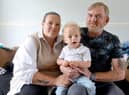 Harry Trotter aged 21 months with parents Sonia Porter and Anthony Trotter.