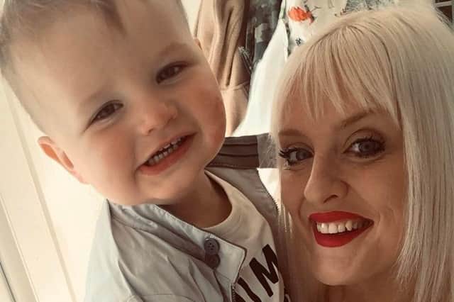 All smiles from mum and son.
