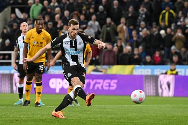 Chris Wood scoring for Newcastle United against Wolves (Photo by Stu Forster/Getty Images)