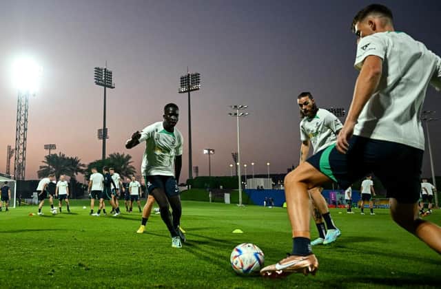 Australia's Garang Kuol and team-mates attend a training session at the Aspire Academy in Doha.