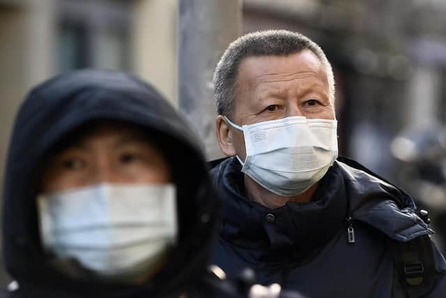 Tourists in Edinburgh continue to take precautions and wear masks due to the coronavirus outbreak