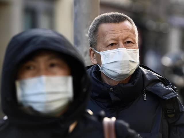 Tourists in Edinburgh continue to take precautions and wear masks due to the coronavirus outbreak