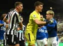 New Newcastle United signing Anthony Gordon clashes with Nick Pope and Sven Botman while playing for Everton in October.