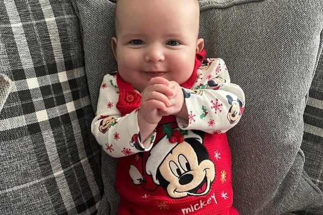 Freddie, age 5 months, ready to celebrate his first Christmas.