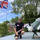Fenwick Avenue residents Darren and Victoria Hanson with a Spitfire plane they created to commemorate the anniversary of VE Day during their street party last year.