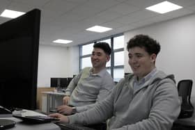 Sam and Arran (from left to right)   eQS Group Assistant Management Accountant Sam Waddle mentoring Finance Apprentice Arran Martin.