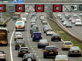 Motorists drive on the hard shoulder of one of the busiest stretches of motorway in Britain between junctions 3 and 7 of the M42