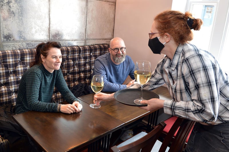 Employees like Karen still have to wear face masks while indoors, along with customers unless they are sat down.