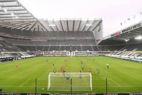A general view of the action infront of empty seats during the Premier League match between Newcastle United and Southampton at St. James Park on February 06, 2021 in Newcastle upon Tyne, England. Sporting stadiums around the UK remain under strict restrictions due to the Coronavirus Pandemic as Government social distancing laws prohibit fans inside venues resulting in games being played behind closed doors. (Photo by Stu Forster/Getty Images)
