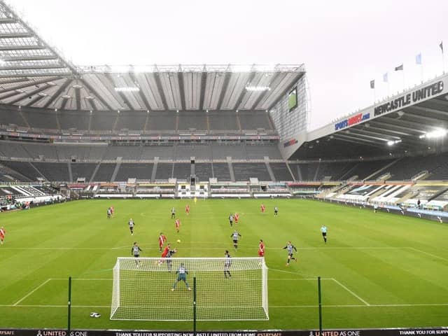 A general view of the action infront of empty seats during the Premier League match between Newcastle United and Southampton at St. James Park on February 06, 2021 in Newcastle upon Tyne, England. Sporting stadiums around the UK remain under strict restrictions due to the Coronavirus Pandemic as Government social distancing laws prohibit fans inside venues resulting in games being played behind closed doors. (Photo by Stu Forster/Getty Images)
