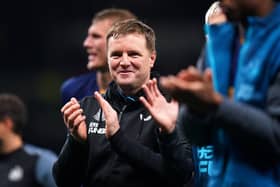 Newcastle United manager Eddie Howe applauds the fans.
