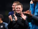 Newcastle United manager Eddie Howe applauds the fans.