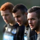 Adam Armstrong with Newcastle United team-mates Steven Taylor and Jack Colback in 2014.